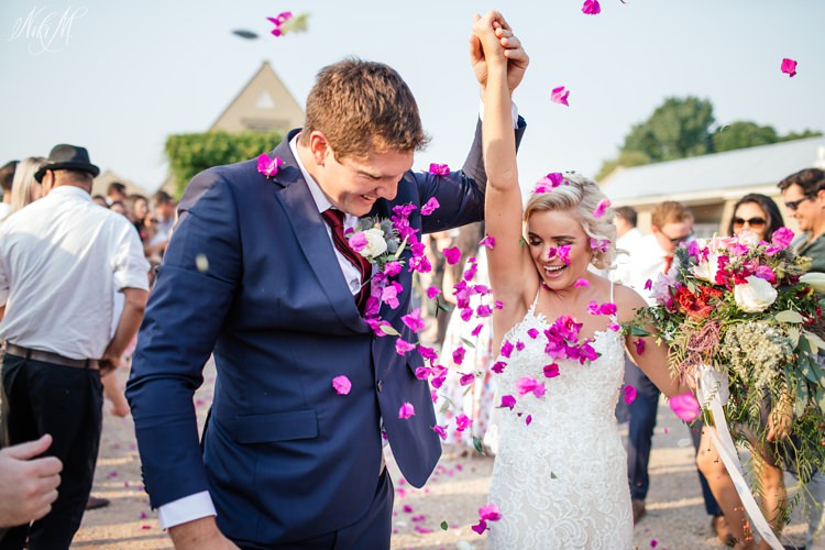 Confetti toss with pink flowers