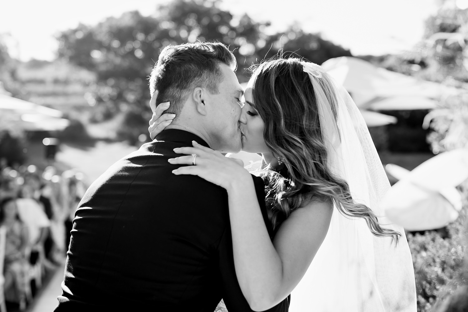 The most beautiful and romantic black and white first kiss wedding photograph by South African wedding photographer Niki M