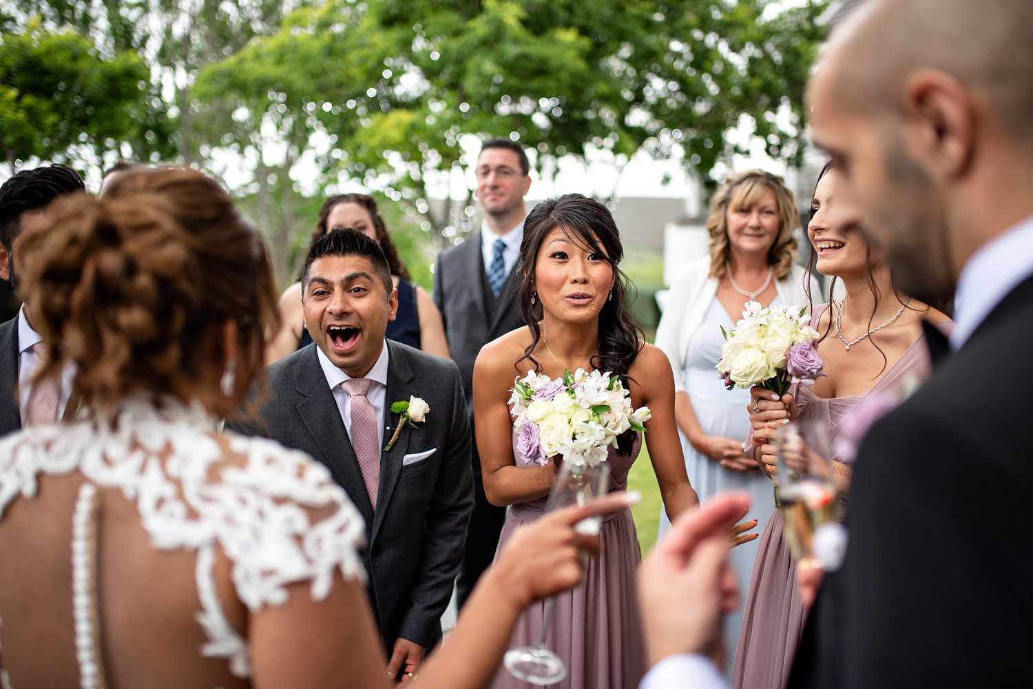 Reaction of the guests after the groom had performed sabered champagne at his wedding in Hermanus