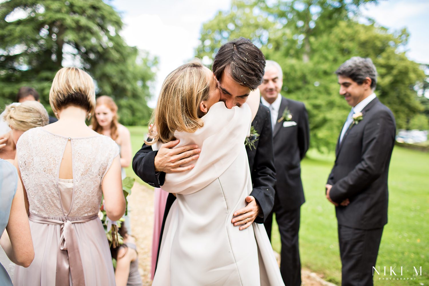 Couple are congratulated after their marriage ceremony at Chateau de la Bourlie Dordogne Wedding