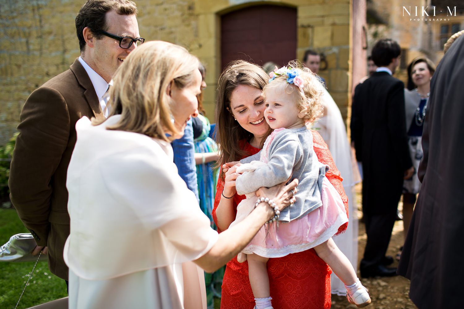 Couple are congratulated after their marriage ceremony at Chateau de la Bourlie Dordogne Wedding