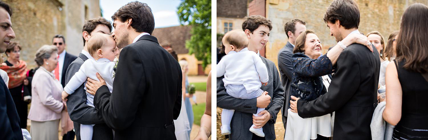 Couple are congratulated after their marriage ceremony at Chateau de la Bourlie Dordogne Wedding