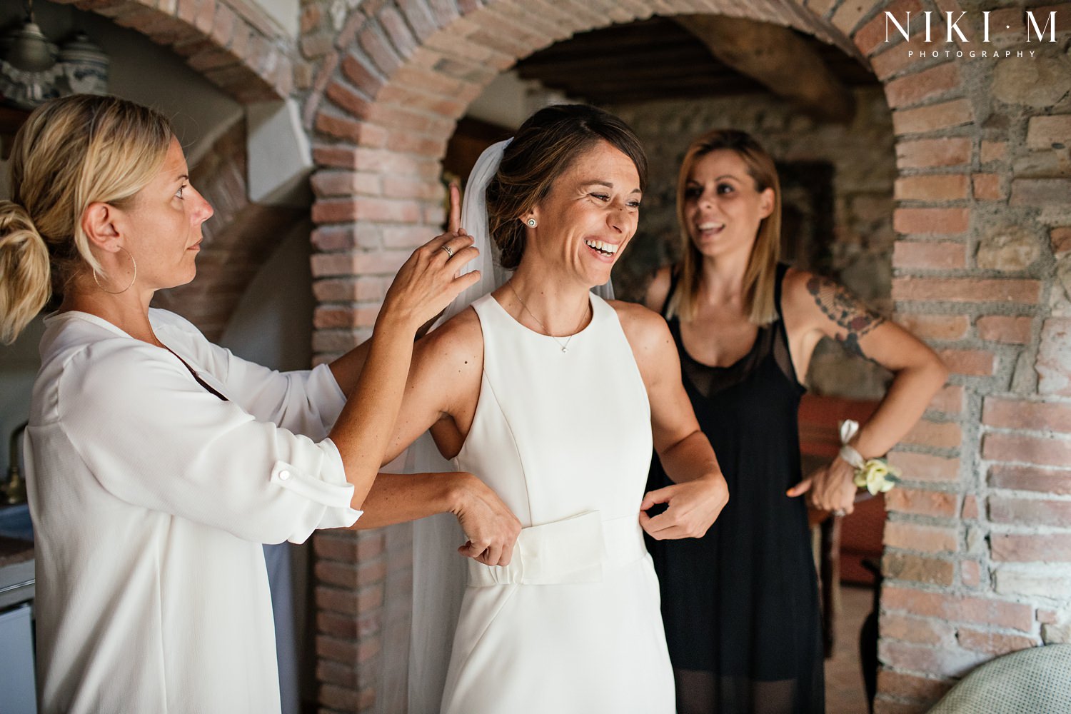 The Bride gets ready before the big day at her Tuscany wedding venue, Villa Ricrio