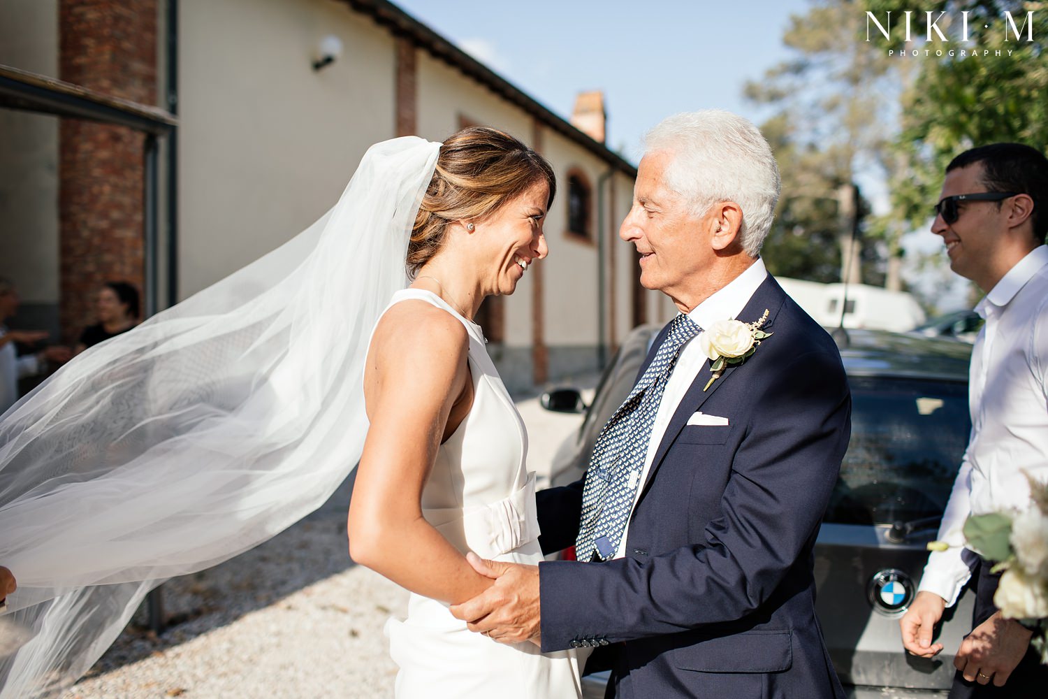 The bride sees her dad for the first time at her wedding in Tuscany, Italy