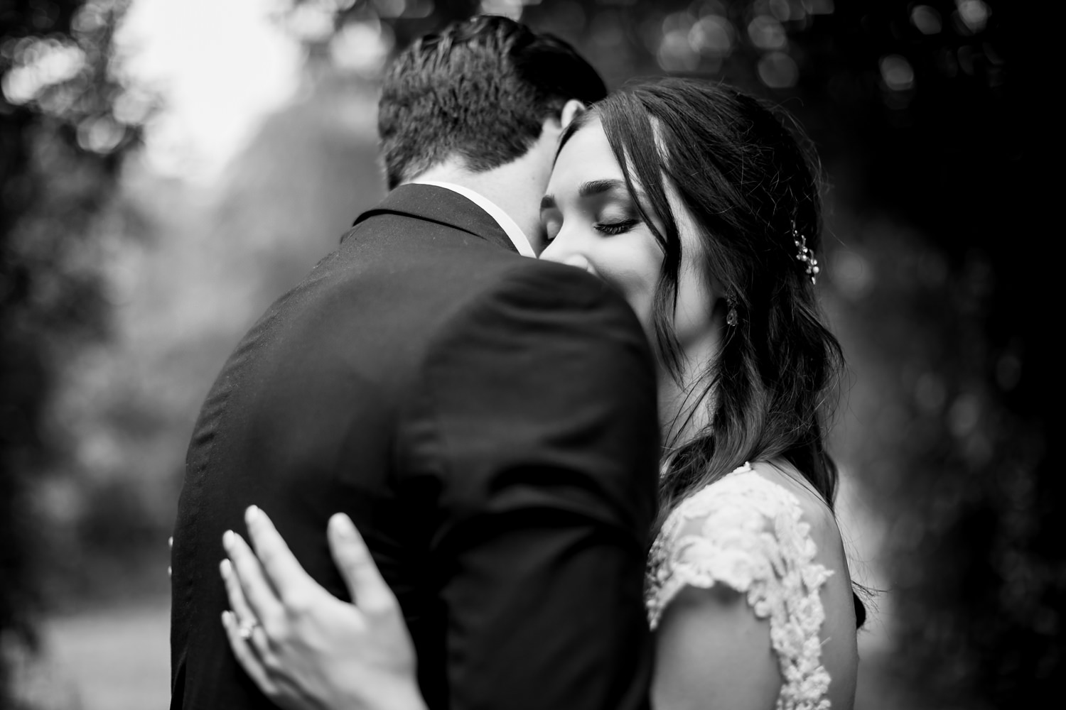 Wedding photographer in South Africa captures a tender and romantic moment between the bride and groom captured in black and white during the couple photo session on their wedding day