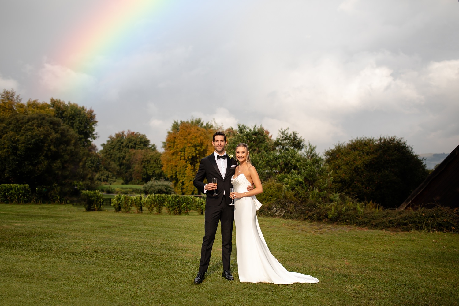 Sunshine and a rainbow after a rainy drakensberg wedding ceremony.