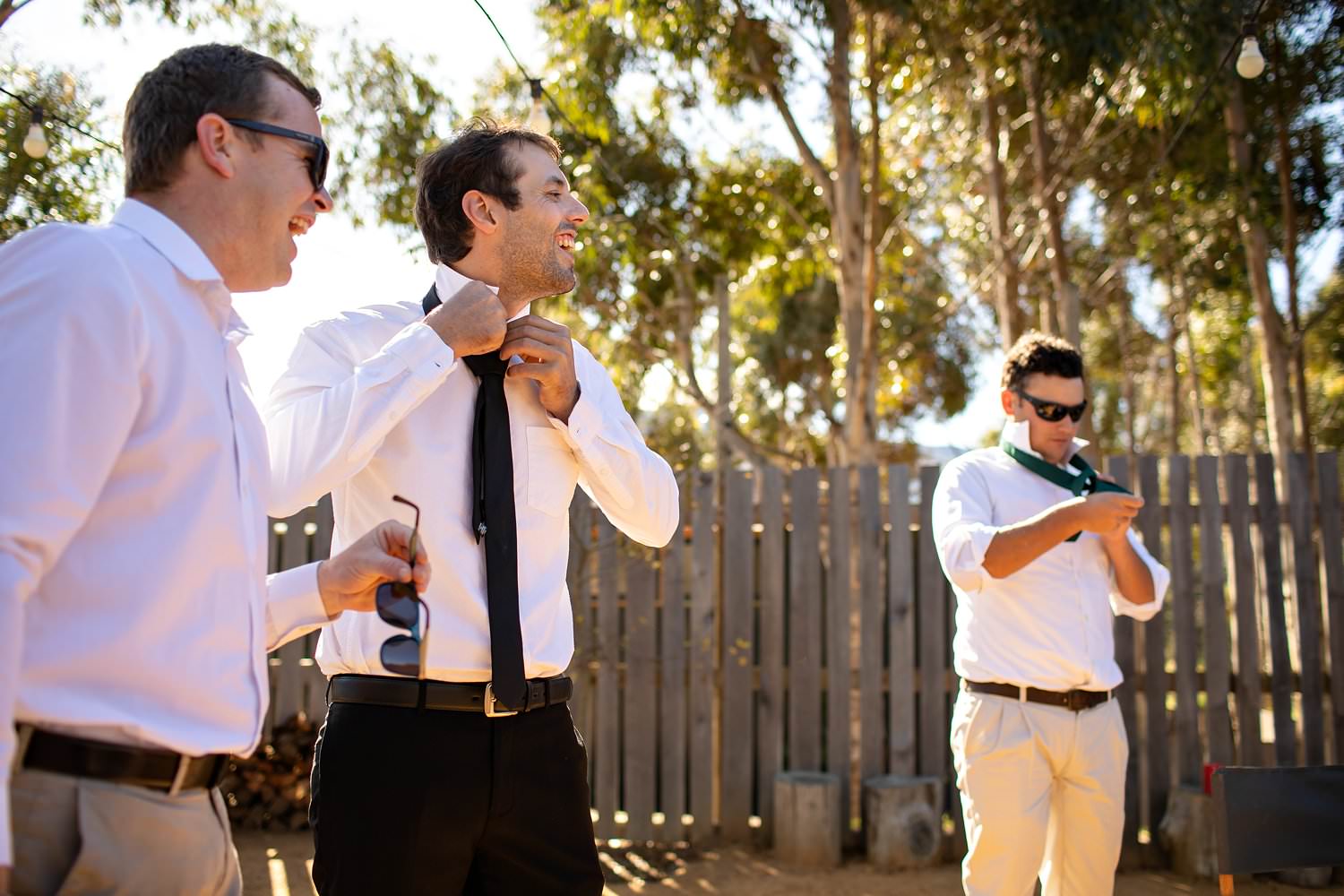 The groom gets ready with his groomsmen at Cherry Glamping for his Elgin Wedding