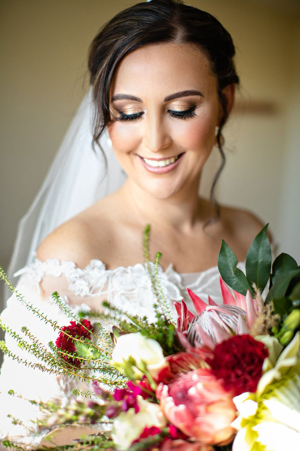 Bridal portrait of a bride with beautiful make up by Ilana Geldenhuys at an Elgin Wedding in Cape Town.