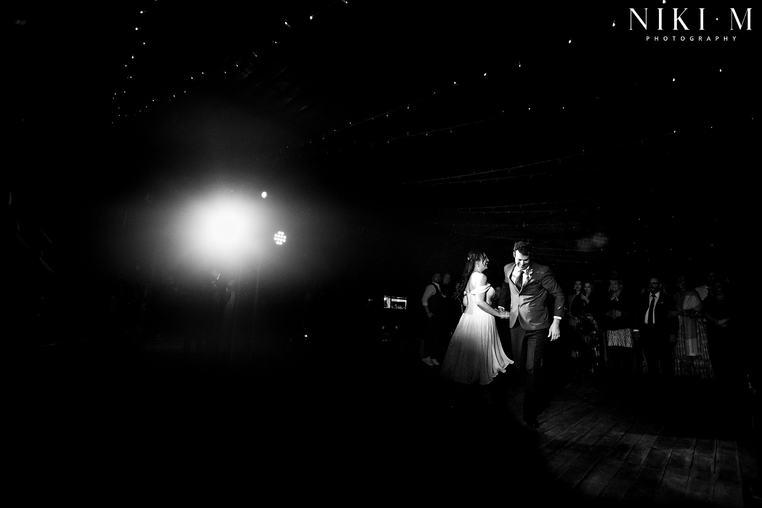 The bride and groom enter their reception venue with a dance at their Elgin wedding