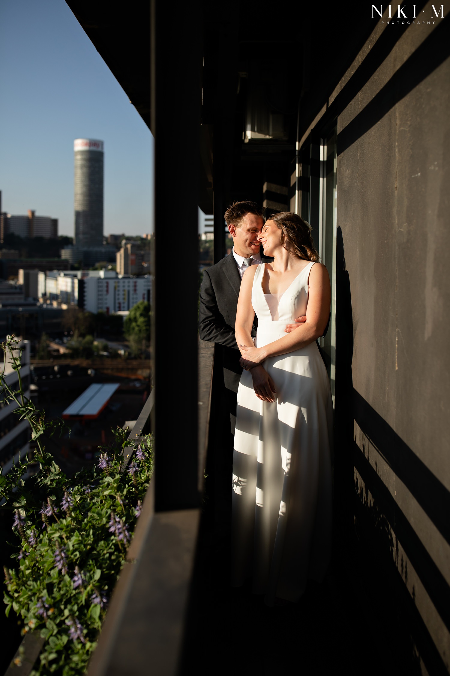 Couple photos in the city after their Johannesburg wedding ceremony at Hallmark House Hotel