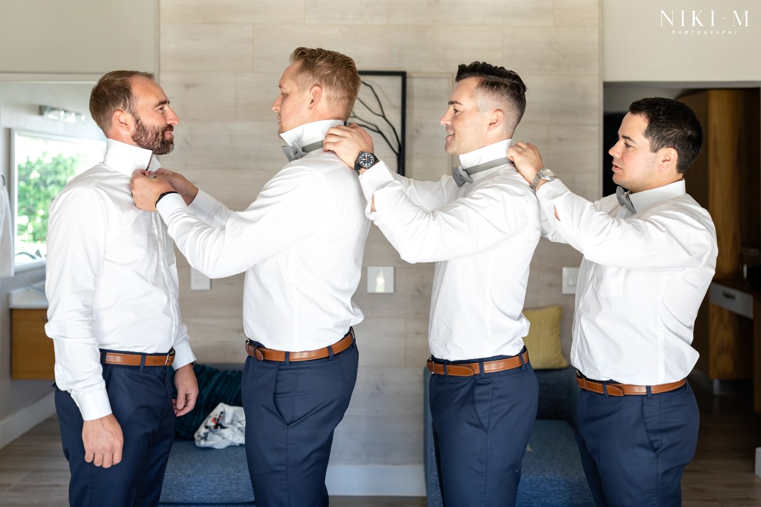 Wedding bow ties with navy suits