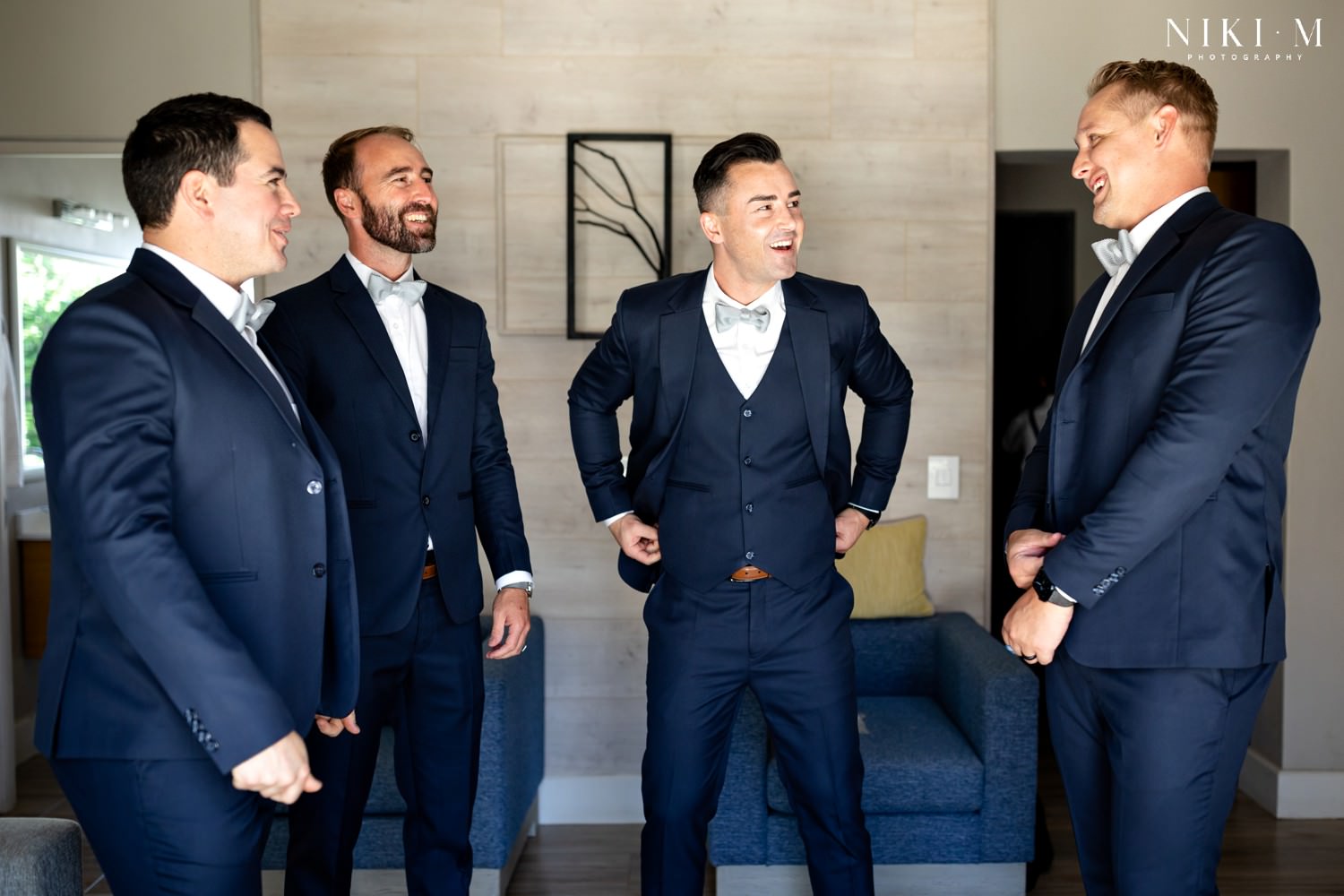 Navy three piece suit for groomat his Cavalli Estate Wedding