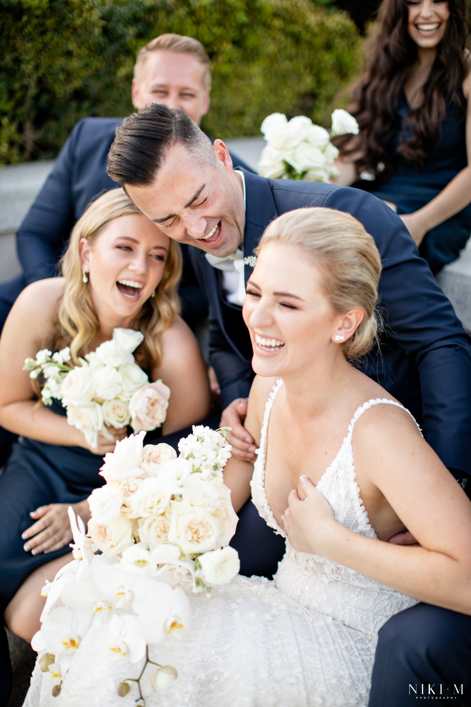 Candid and natural bridal party photos at a white and navy wedding in Cape Town