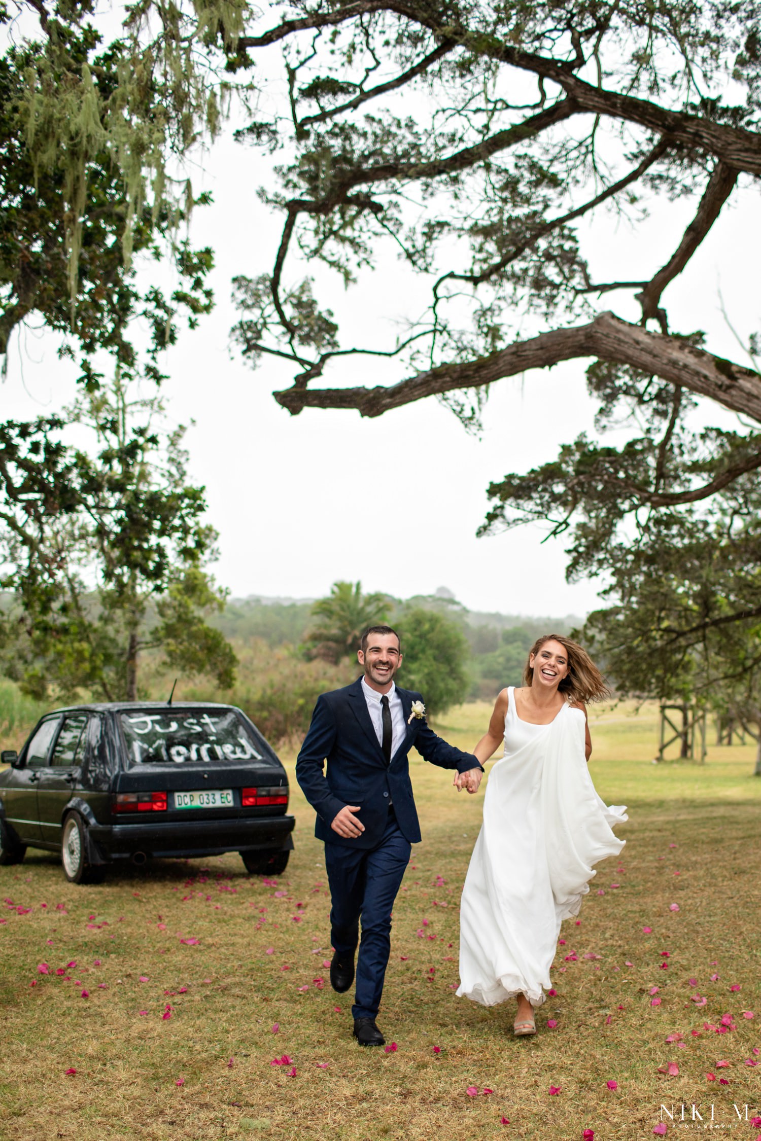 Photos of the bride and groom with their Citi Golf wedding car.