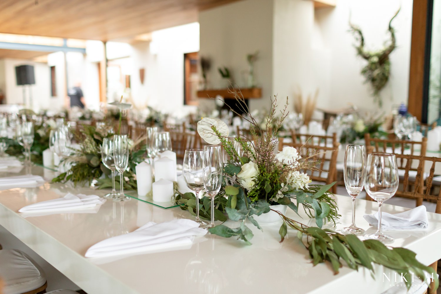 Beautiful, clean white wedding decor and flowers.