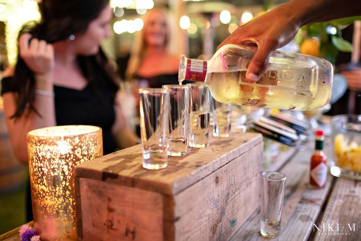 A tequila stand at a festival-themed wedding in the garden route of South Africa