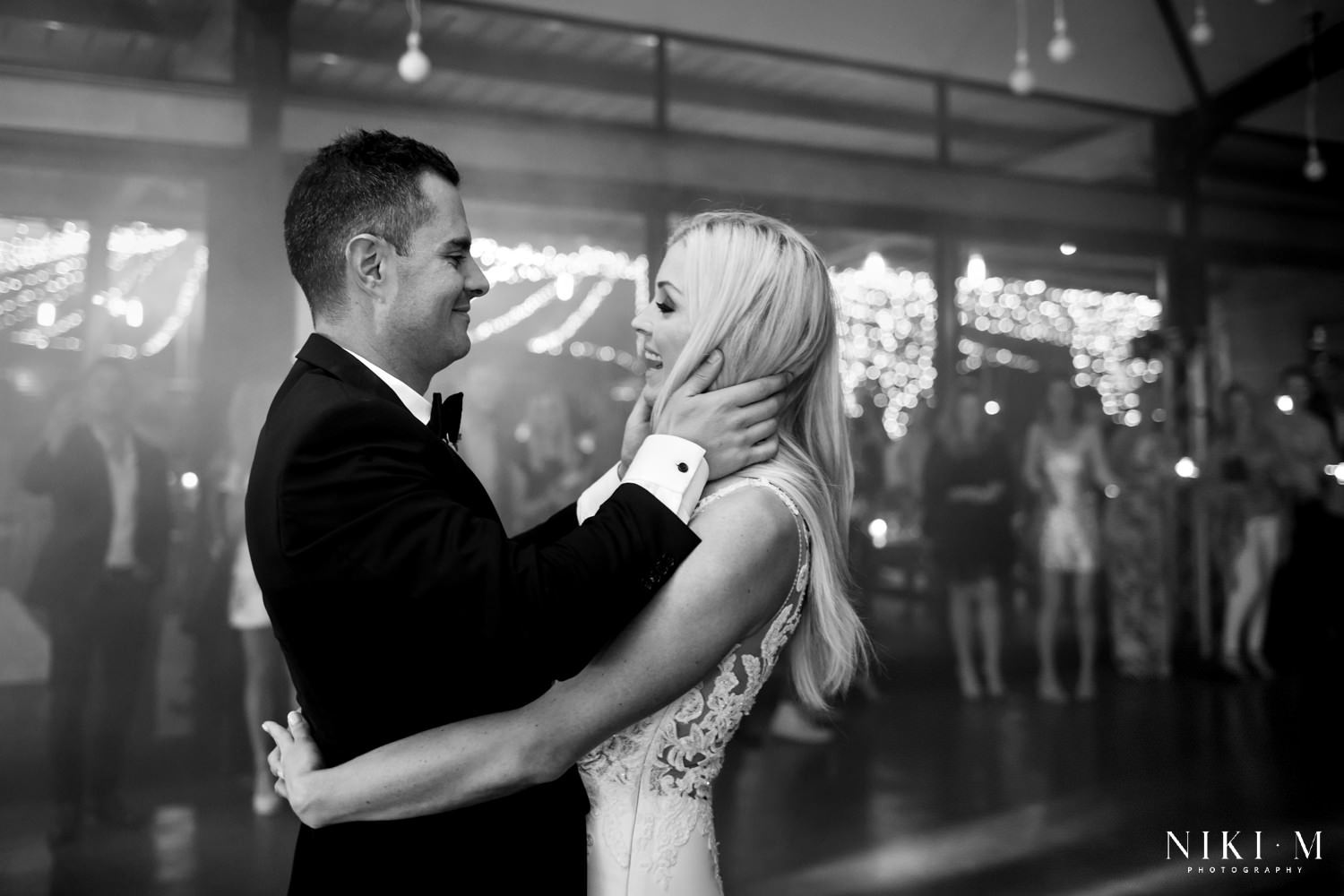 Black and White image of the bride and groom during their first dance at Kay and Monty