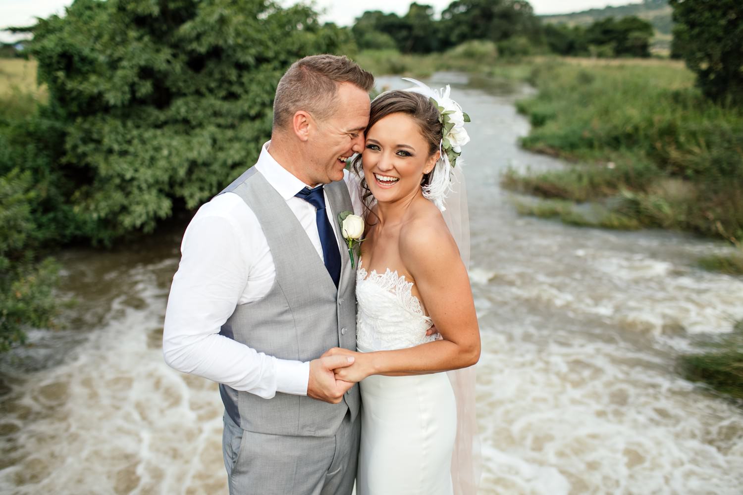 A bride and groom at their bush wedding. Karkloof Safari Spa, KZN. Image by safari photographer Niki M