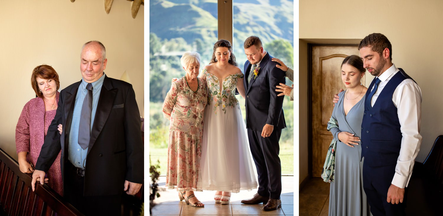 Parents and friends of the bride and groom join in a heartfelt prayer circle, with golden mountain light spilling into the chapel behind them at a Drakensberg micro-wedding