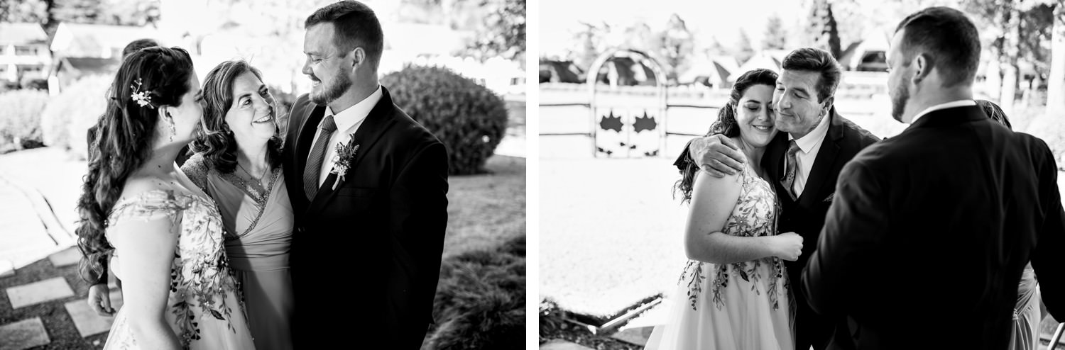 Tender family embraces as the bride and groom share heartfelt moments with loved ones after their vows, photographed against the peaceful Champagne Valley backdrop.