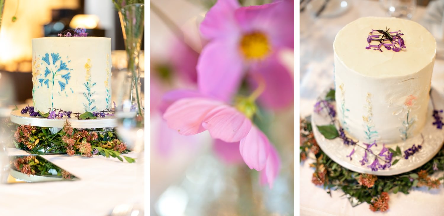 Floral wedding cake with hand-painted botanical details and wildflower decor. A nature-inspired design photographed at Champagne Castle Hotel wedding reception.